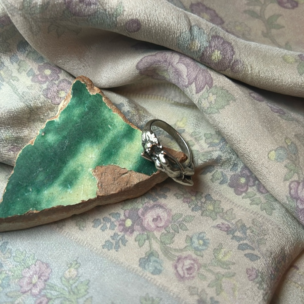 laying woman ring